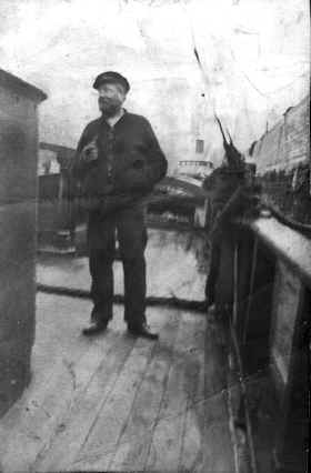 Captain Sharp on the deck of his tug